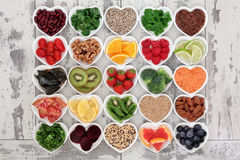 detox-diet-food-super-selection-heart-shaped-porcelain-bowls-over-distressed-wooden-background-50802898